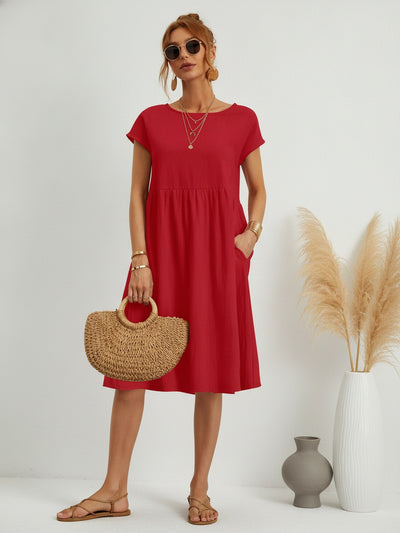 Femme Robe Midi Manches Courtes avec Col Rond et Poches Latérales