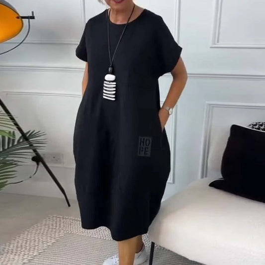 Femme Robe Midi Manches Courtes Oversize avec Col Rond et Imprimé Lettres