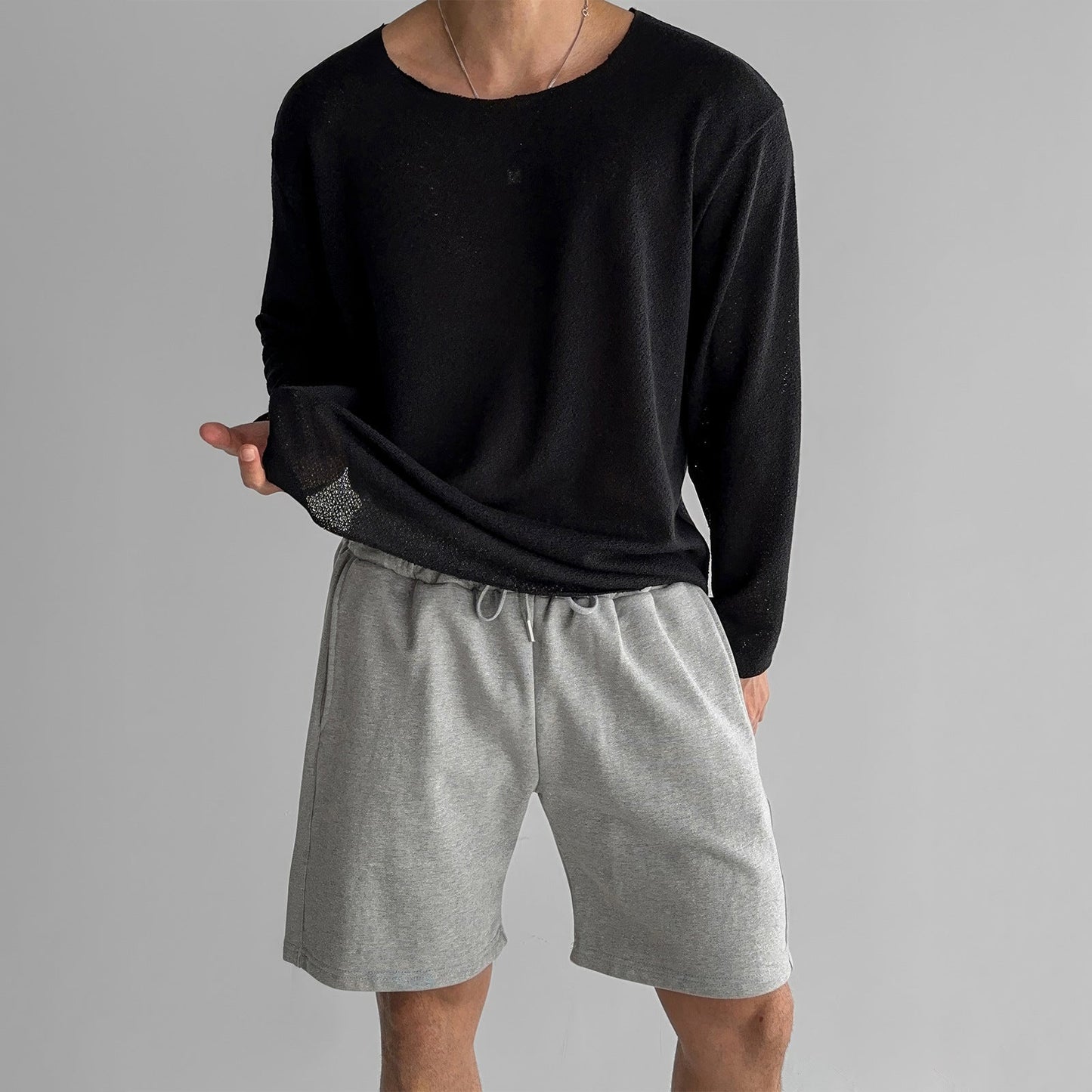 Homme Pull Léger Manches Longues avec Col Rond et Coupe Oversize