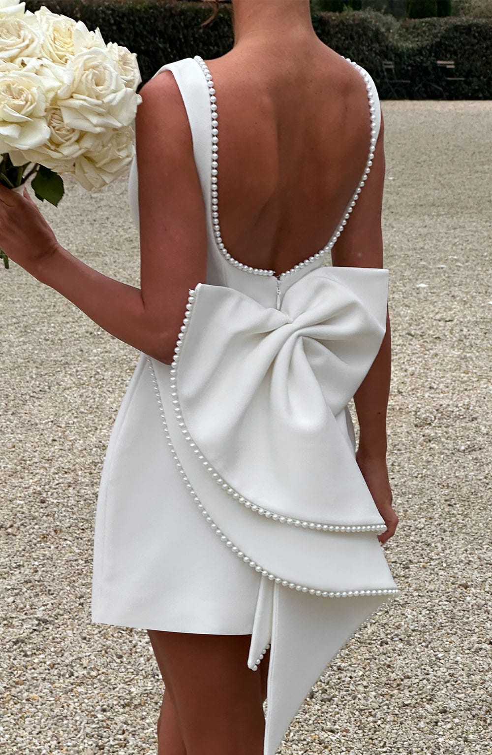 Femme Mini Robe sans Manches A-ligne avec Nœud au Dos et Col Orné de Perles