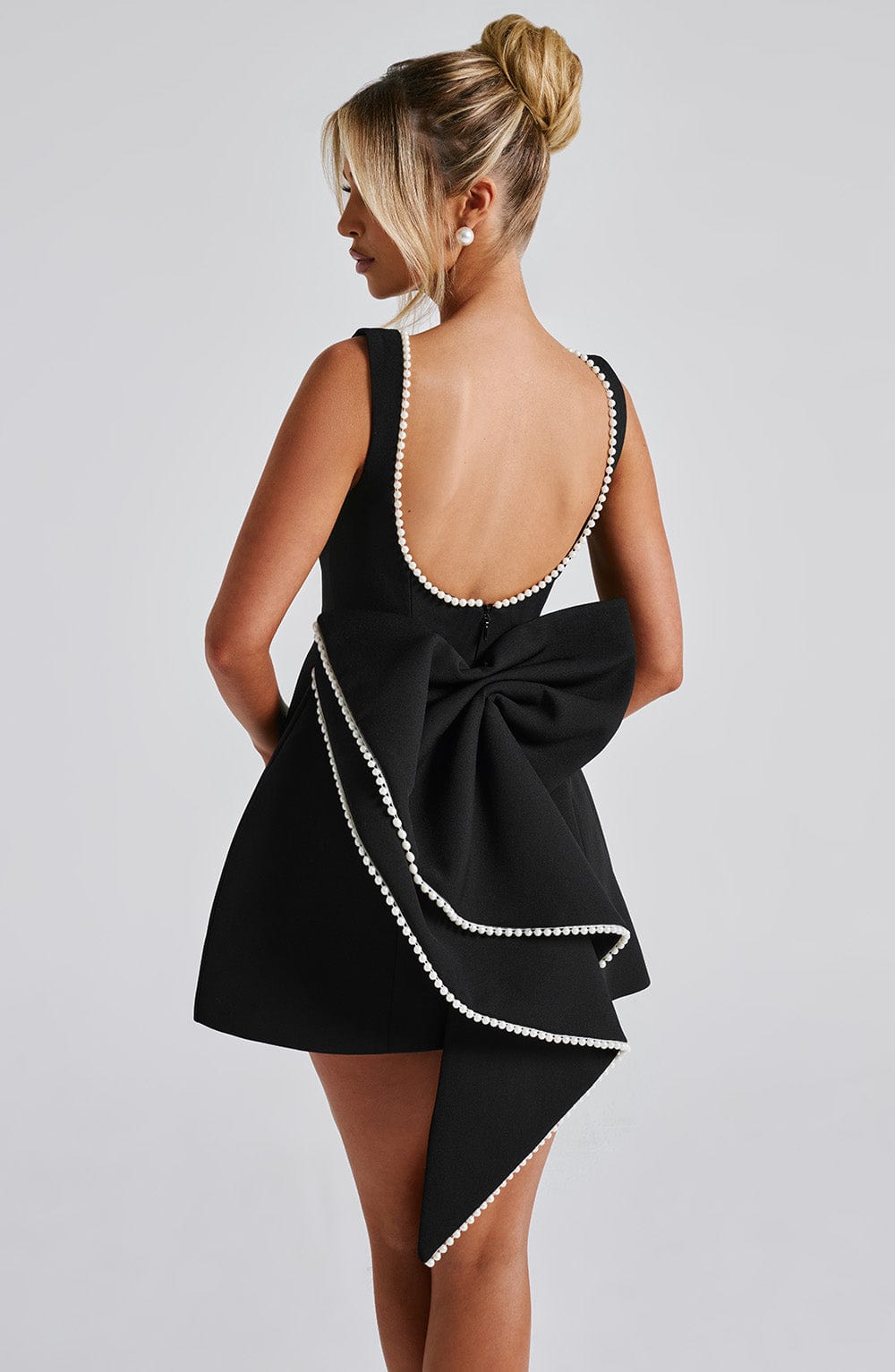 Femme Mini Robe sans Manches A-ligne avec Nœud au Dos et Col Orné de Perles