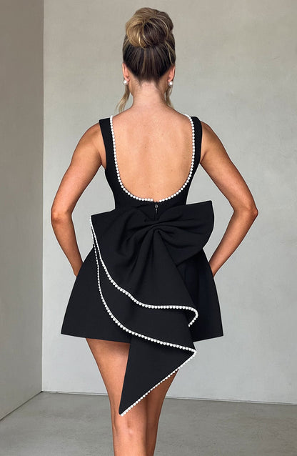 Femme Mini Robe sans Manches A-ligne avec Nœud au Dos et Col Orné de Perles
