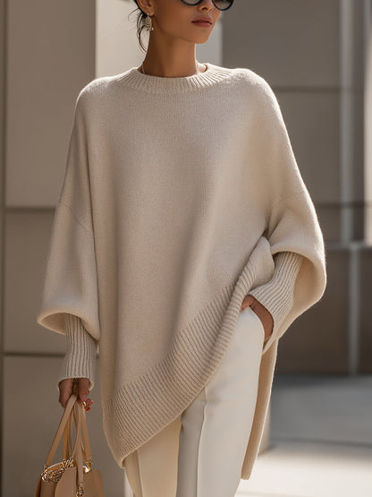 Femme Pull Oversized à Manches Chauve-Souris et Col Rond avec Ourlet Asymétrique