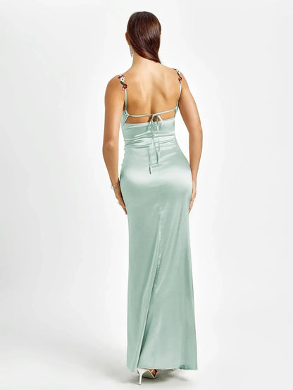 Femme Robe de Soirée Longue Slim Fit sans Manches avec Encolure Bénitier et Ornements Floraux