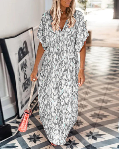 Femme Robe Maxi Manches Courtes avec Col en V et Imprimé Abstrait Coupe Ample
