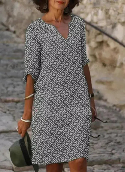 Femme Robe Midi à Imprimé Géométrique avec Col en V et Manches Trois-Quarts