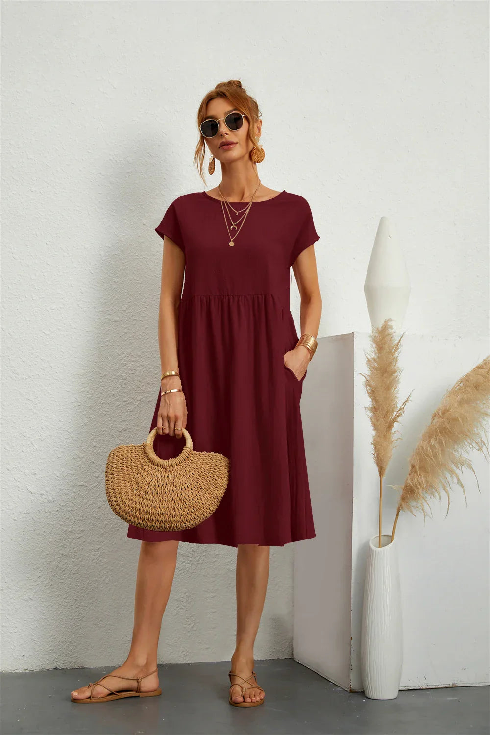 Femme Robe Midi Manches Courtes avec Col Rond et Poches Latérales