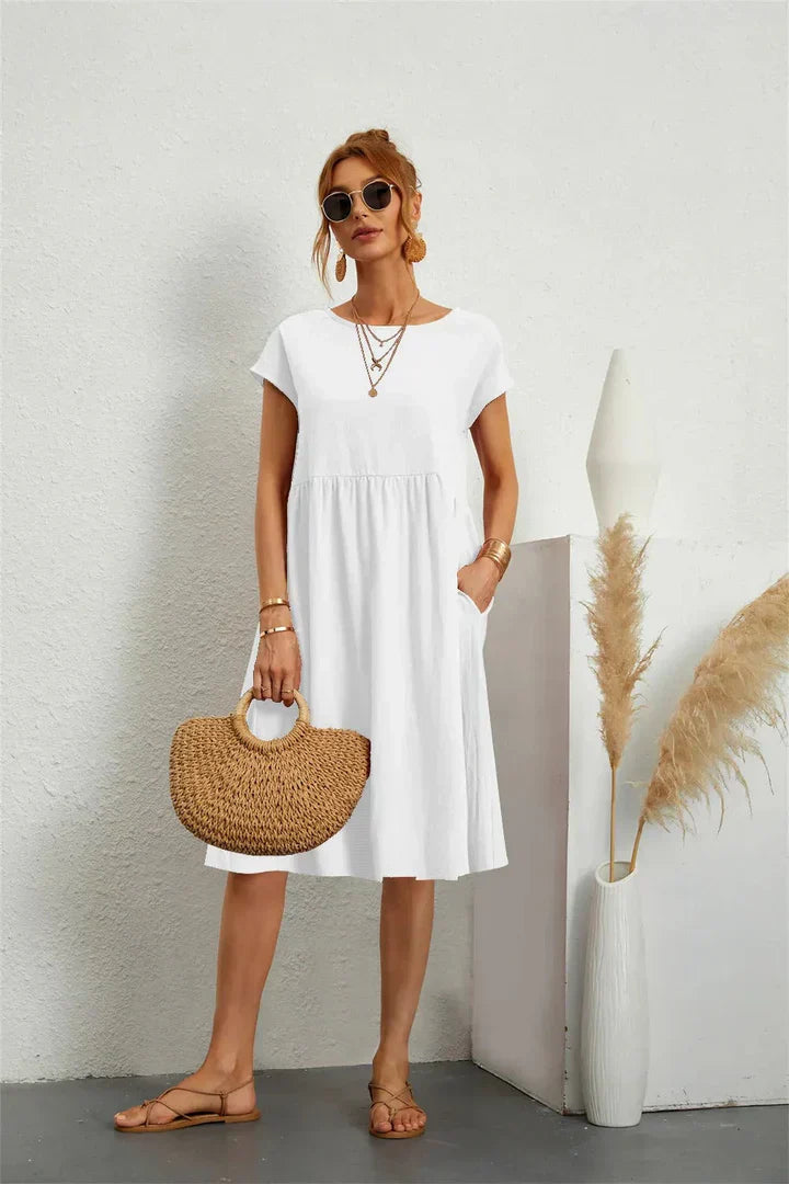 Femme Robe Midi Manches Courtes avec Col Rond et Poches Latérales