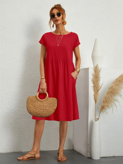 Femme Robe Midi Manches Courtes avec Col Rond et Poches Latérales