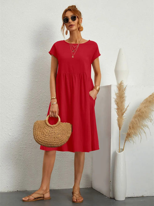 Femme Robe Midi Manches Courtes avec Col Rond et Poches Latérales