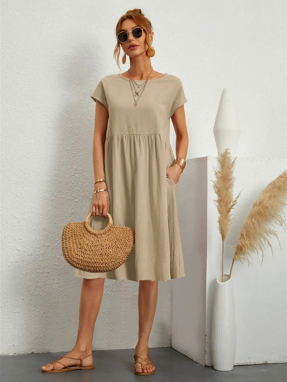 Femme Robe Midi Manches Courtes avec Col Rond et Poches Latérales