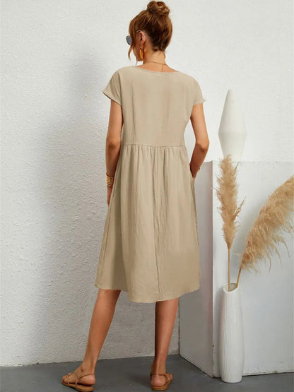 Femme Robe Midi Manches Courtes avec Col Rond et Poches Latérales