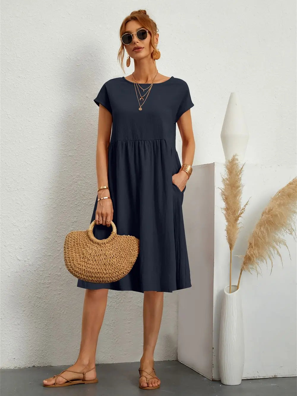 Femme Robe Midi Manches Courtes avec Col Rond et Poches Latérales