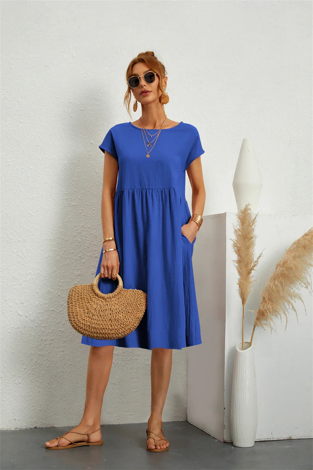 Femme Robe Midi Manches Courtes avec Col Rond et Poches Latérales
