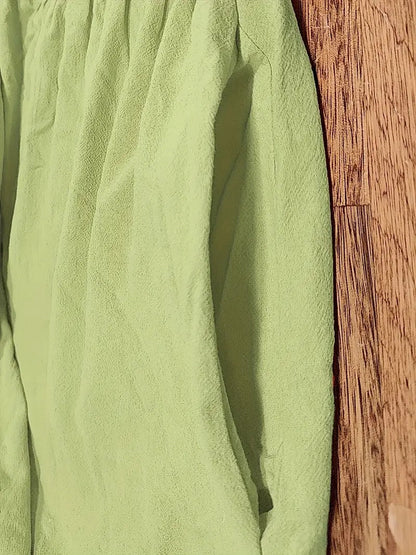 Femme Robe Midi Manches Courtes col Rond avec Poches et Coupe Ample