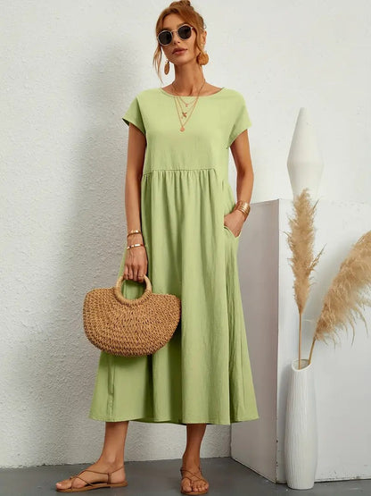 Femme Robe Midi Manches Courtes col Rond avec Poches et Coupe Ample