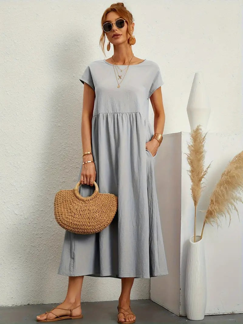 Femme Robe Midi Manches Courtes col Rond avec Poches et Coupe Ample