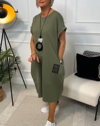 Femme Robe Midi Manches Courtes Oversize avec Col Rond et Imprimé Lettres