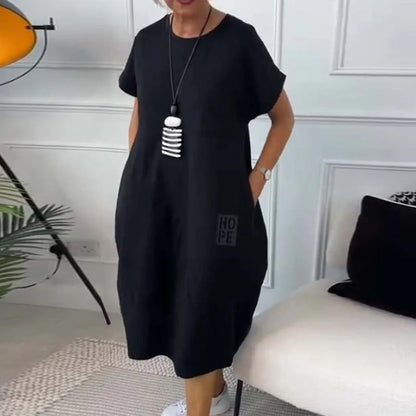 Femme Robe Midi Manches Courtes Oversize avec Col Rond et Imprimé Lettres