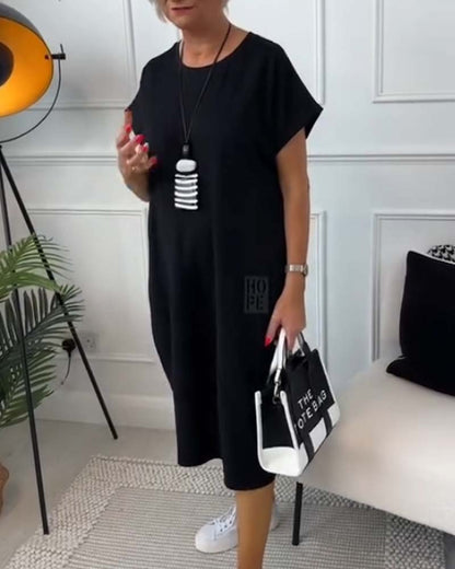Femme Robe Midi Manches Courtes Oversize avec Col Rond et Imprimé Lettres