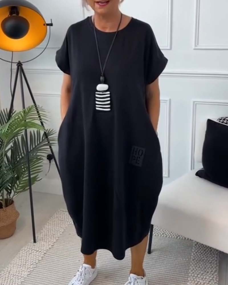 Femme Robe Midi Manches Courtes Oversize avec Col Rond et Imprimé Lettres