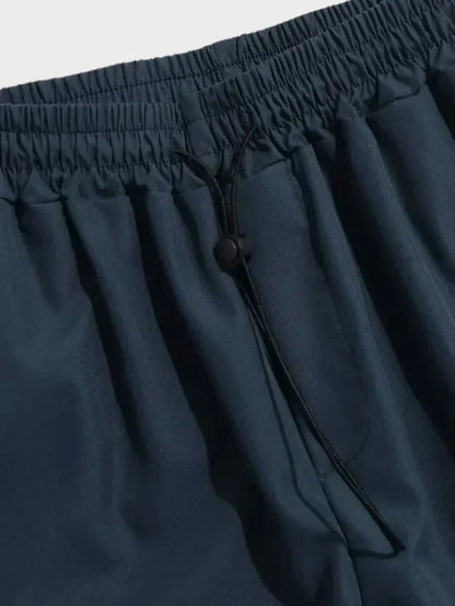 Homme Pantalon Cargo Large avec Ceinture Élastique et Chevilles Ajustables