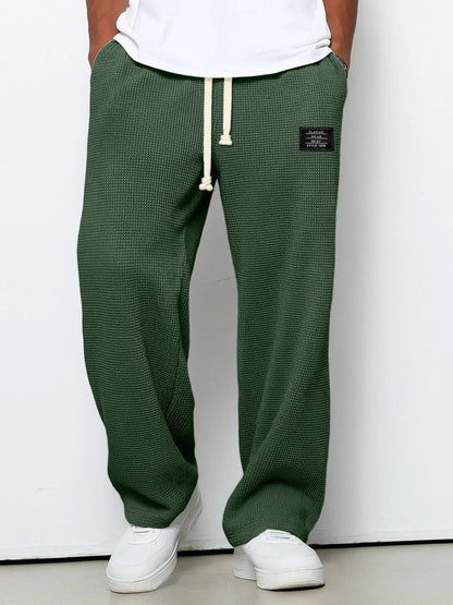 Homme Pantalon de Jogging Relaxed Fit avec Cordon de Serrage