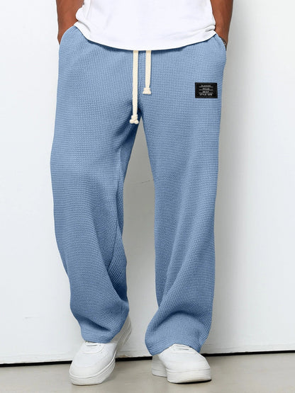 Homme Pantalon de Jogging Relaxed Fit avec Cordon de Serrage