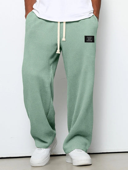 Homme Pantalon de Jogging Relaxed Fit avec Cordon de Serrage