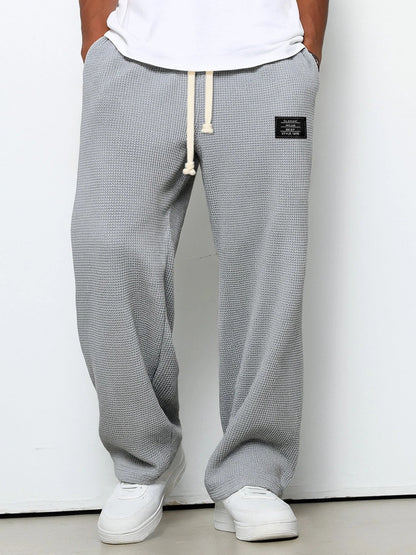 Homme Pantalon de Jogging Relaxed Fit avec Cordon de Serrage