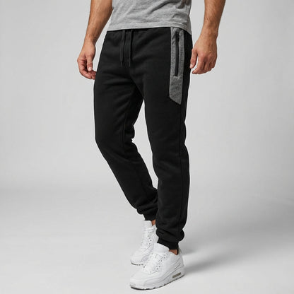 Homme Pantalon de Jogging Slim avec Poche Zippée et Bas Resserré